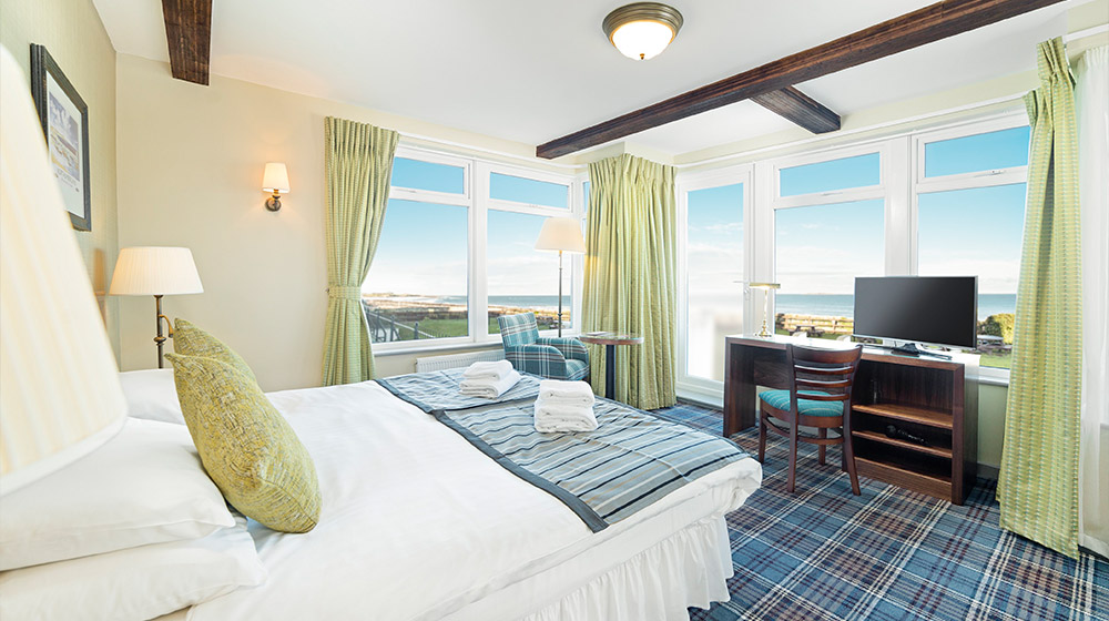premium sea view bedroom at Bamburgh Castle Inn, Seahouses