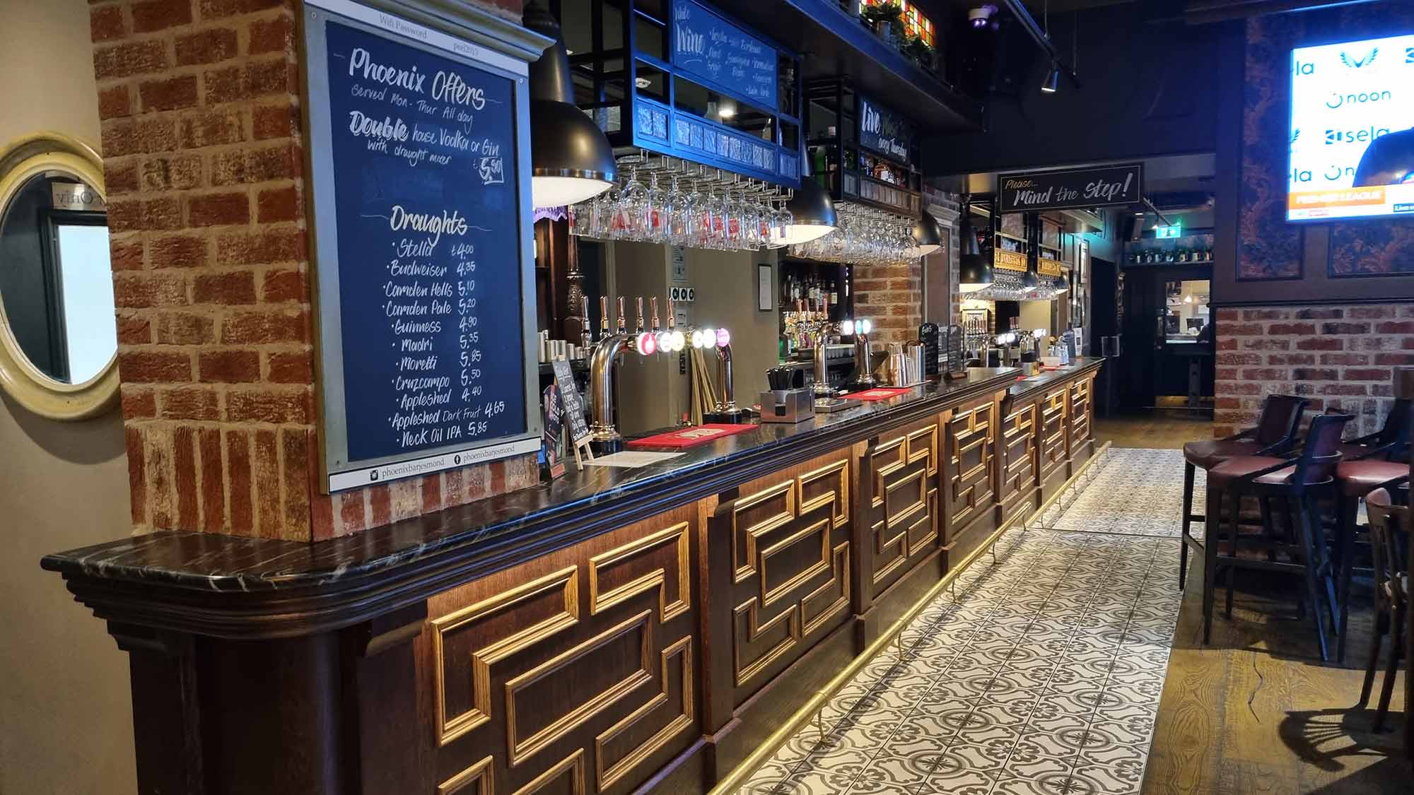 Long view of the bar interior at The Phoenix, Newcastle upon Tyne